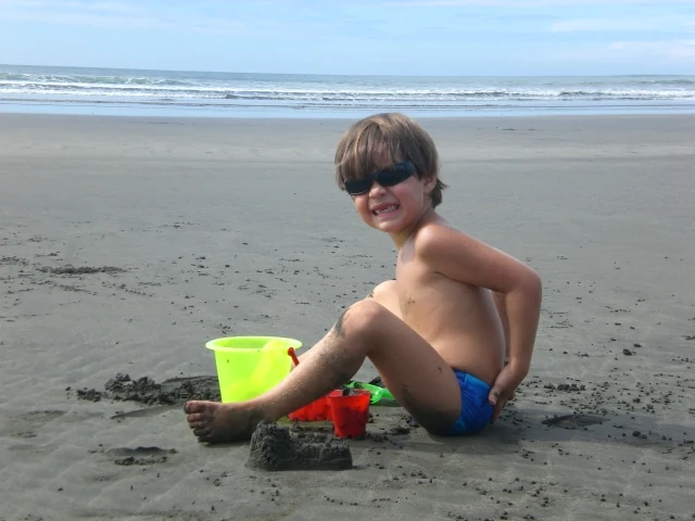 A child playing on a Panama beach
